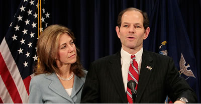 New York Governor Eliot Spitzer, not looking forward to the limo ride home with his wife